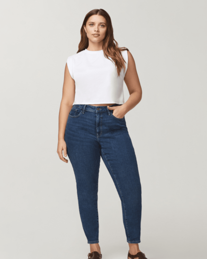 Front of a model wearing a size 14 JFK Skinny Jeans in Soon by Warp + Weft. | dia_product_style_image_id:248954